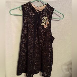 Black Lace Sleeveless Top with Floral Embellishment